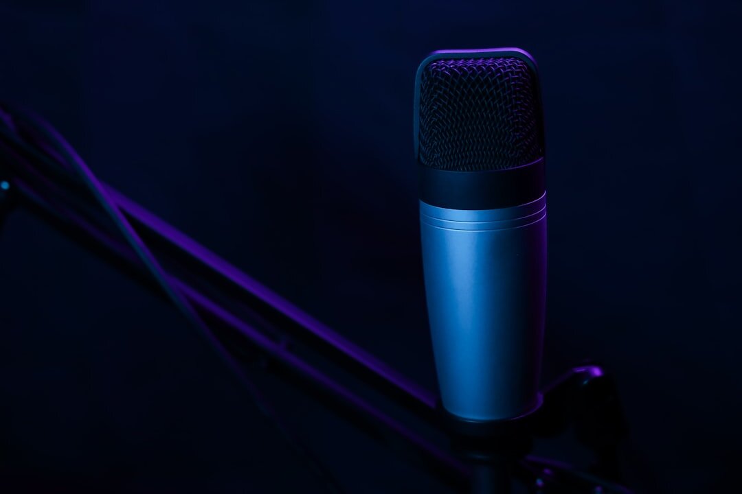 Close-up of a professional condenser microphone in a studio
